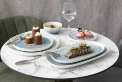 Assiette de présentation ovale ivoire grès émaillé 28 cm Pacific - PRO.MUNDI Discount