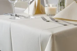Nappe ivoire non tissé 180x127 cm Evolin (25 pièces) - DUNI New