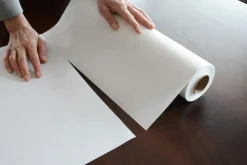 Rouleau tête à tête blanc non tissé 0,4x24 m Evolin - DUNI Sale